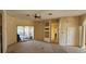Spacious living room with neutral walls, a ceiling fan, and sliding door access to a patio at 315 Villa Sorrento Cir, Haines City, FL 33844