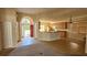 Inviting open floorplan showcasing the kitchen and living area with tile flooring at 315 Villa Sorrento Cir, Haines City, FL 33844