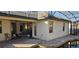 An enclosed pool area of a home with a brick patio and many doors and windows at 315 Villa Sorrento Cir, Haines City, FL 33844