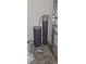 Image featuring a water softener system inside the garage at 315 Villa Sorrento Cir, Haines City, FL 33844