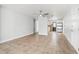 Bright living room with ceiling fan and tile flooring at 725 Strain Blvd, Lakeland, FL 33815