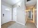 Inviting entryway features tile floors and white door for a clean and modern look at 1625 Avenue D Ne, Winter Haven, FL 33881