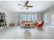 Spacious living room with large windows and stylish decor at 1625 Avenue D Ne, Winter Haven, FL 33881