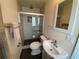 Bathroom featuring a glass-enclosed shower, modern vanity, and tiled floors at 753 Avenue O Se, Winter Haven, FL 33880