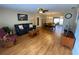 Open concept living room featuring bright picture window and dining room combo at 753 Avenue O Se, Winter Haven, FL 33880