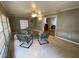 Cozy sunroom featuring comfortable seating, ceiling fan, and bright natural light at 753 Avenue O Se, Winter Haven, FL 33880