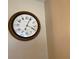 A simple wall clock with a white face and dark numerals at 753 Avenue O Se, Winter Haven, FL 33880