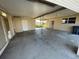 Large, covered carport area with concrete flooring and access to the backyard at 100 High St, Winter Haven, FL 33880