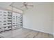 Bedroom featuring hardwood floors and a large window with city views at 101 S Eola Dr # 813, Orlando, FL 32801