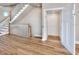 Interior shot of an elevator next to a staircase with wood floors at 15 Marden Dr, Ormond Beach, FL 32176