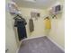 Well-organized walk-in closet with shelving and hanging space at 5888 Meditation Dr, Clermont, FL 34714