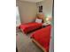 Bright bedroom with carpet, neutral walls and two twin-size beds at 1310 Seasons Blvd, Kissimmee, FL 34746