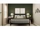 Bedroom with a wrought iron bed frame, neutral color palette, and ambient lighting at 5786 Meditation Dr, Clermont, FL 34714