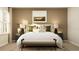Bedroom with a king size bed, bench and a window with natural light at 5786 Meditation Dr, Clermont, FL 34714