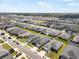 An aerial view of a community of single Gathering homes at 653 Vittorio Dr, Winter Haven, FL 33884