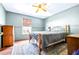 Bedroom featuring natural light from window, carpet, and neutral tones at 114 Shaddock Dr, Auburndale, FL 33823