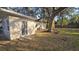 Backyard featuring a large mature tree at 1804 S Mellonville Ave, Sanford, FL 32771