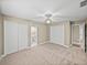 Spacious bedroom featuring dual closets and access to an ensuite bathroom at 2024 Count Ct, Lakeland, FL 33813