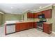 Kitchen featuring stainless steel appliances and wood cabinets at 819 22Nd Nw St, Winter Haven, FL 33881
