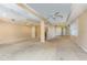 Spacious living room with carpet flooring, ceiling fans, and natural light at 819 22Nd Nw St, Winter Haven, FL 33881