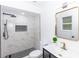 Sleek, modern bathroom with a walk-in shower, stylish tile work, and contemporary fixtures at 1897 West Pkwy, Deland, FL 32724