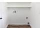 A clean and functional laundry area with shelving, ready for your washer and dryer at 1897 West Pkwy, Deland, FL 32724