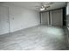 Living room with gray walls, ceiling fan and large window at 427 Donald St, Lakeland, FL 33813