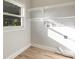 Bright laundry room featuring natural light, ample shelving, and a clean, organized space at 6214 Elm E Sq, Lakeland, FL 33813