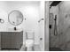 Modern bathroom featuring a vanity with stylish fixtures and a sleek, glass-enclosed shower at 2015 Poe St, Lakeland, FL 33801