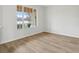 Cozy bedroom with light floors and a large window, providing ample natural light at 2726 Herons Landing Dr, Kissimmee, FL 34741