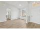 Bright living room with neutral paint, light floors, and plenty of natural light at 2726 Herons Landing Dr, Kissimmee, FL 34741