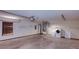 Spacious garage featuring laundry appliances, shelving, and ample room for parking and storage at 290 Ne 51St Ave, Ocala, FL 34470