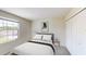 Well-lit bedroom with neutral tones, closet, and a comfortable bed at 4759 Golden Knight Blvd, Kissimmee, FL 34746