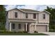 Charming two-story home with a front porch, attached two-car garage, and neutral toned siding at 4759 Golden Knight Blvd, Kissimmee, FL 34746
