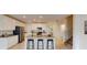 Bright kitchen featuring a spacious island with bar seating and modern stainless steel appliances at 4759 Golden Knight Blvd, Kissimmee, FL 34746
