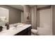 Well-lit bathroom with a vanity, modern fixtures, and a shower-tub combination at 4777 Golden Knight Blvd, Kissimmee, FL 34746