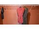 A well-organized walk-in closet offering a variety of hanging and storage options at 4777 Golden Knight Blvd, Kissimmee, FL 34746