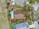 A high angle view of the backyard, pool, and landscaping at 390 Lisa Karen Cir, Apopka, FL 32712