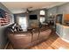 Open concept living room with high ceilings, a ceiling fan, a television, and a dining area at 3079 Barbados Ln, Haines City, FL 33844