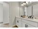 Bright bathroom with double sink vanity, modern fixtures, and stylish decor at 5789 Timber Meadow Way, St Cloud, FL 34771