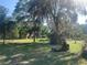Picturesque property featuring mature trees, open green spaces, and a tranquil homesite at 24645 Ne 177Th Ter, Fort Mc Coy, FL 32134