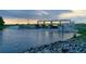 Scenic view of a river dam structure with the sun setting between the dam's archways at 24645 Ne 177Th Ter, Fort Mc Coy, FL 32134