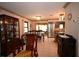 Open dining room and kitchen featuring tile floors and modern stainless steel appliances at 9461 Cr 657, Bushnell, FL 33513