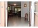 Inviting entryway featuring tiled floors and a view into the dining and living areas at 9461 Cr 657, Bushnell, FL 33513
