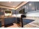 Updated kitchen with granite countertops, stainless steel appliances and tile floors at 9461 Cr 657, Bushnell, FL 33513