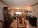 Open-concept living space with tile floors, dining area, and modern kitchen at 9461 Cr 657, Bushnell, FL 33513