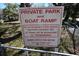 Signage about private park and boat ramp for members only with penalty for trespassing at 9461 Cr 657, Bushnell, FL 33513