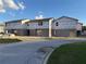 View of the new construction home, with visible weatherproofing and concrete blocks at 222 Carpenters Way # 68, Lakeland, FL 33805