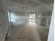 Spacious living room area with a sliding glass door opening to the outside at 222 Carpenters Way # 68, Lakeland, FL 33805