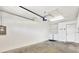 Clean, well-lit garage featuring laundry hookups and ample storage space at 5054 Fairfield Dr, Lakeland, FL 33811